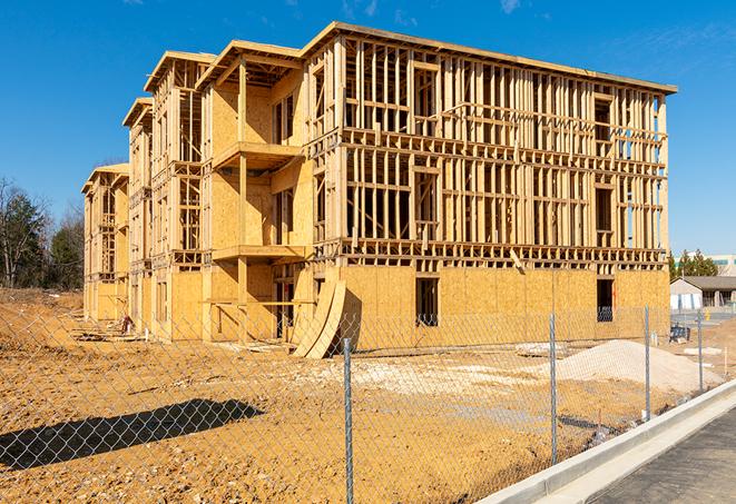 a snapshot of temporary chain link fences protecting a large construction project from unauthorized access in Camden Wyoming